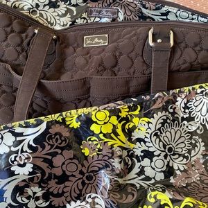 Large chocolate brown Vera Bradley diaper bag with water proof changing pad.